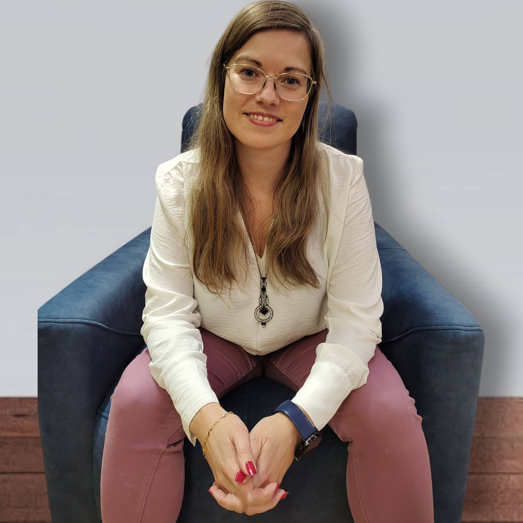 a woman sitting in a chair